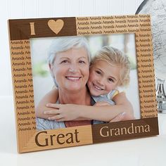 a wooden frame with the words i love great grandma and an image of two children