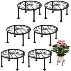 set of four wrought iron plant stands with flower pot