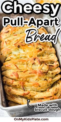 cheesy pull apart bread in a pan with text overlay that reads, pull apart bread