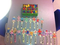 a group of children's toothbrushes sitting on top of a plastic table