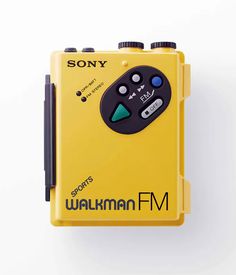 a yellow box with a game controller on it's side and the words walkman fm written in black