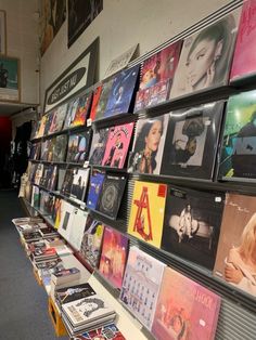 there are many records on the wall in this room, and one is for sale