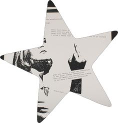 a black and white photo of a star with writing on it's side, in the shape of a woman