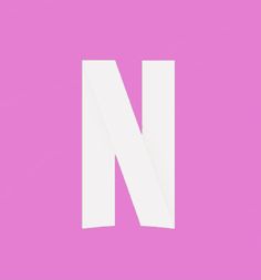 the letter n is made up of white paper on a bright pink background with diagonal edges