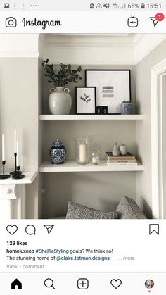 an instagram page with shelves and pictures on the top, one shelf is filled with candles