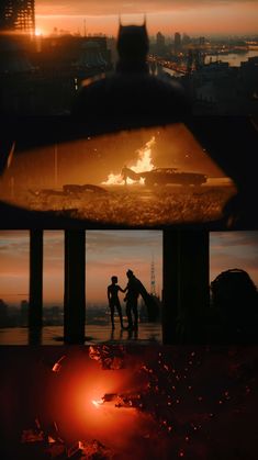 two people standing in front of a fire with the city skyline behind them at sunset