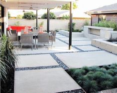 an outdoor dining area with chairs and tables