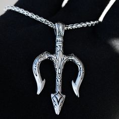 Take Your Style To The Deep Blue Sea With This Stylish Poseidon Trident Pendant. This Pendant Is Crafted From Solid 316l Stainless Steel, Making It Durable And Water-Resistant. It Comes With A 24-Inch Box Chain Necklace, Perfect For Layering Or Wearing On Its Own. The Sleek, Minimalist Design Of This Pendant Makes It A Versatile Addition To Any Jewelry Collection. Whether You're Dressing Up For A Night Out Or Keeping It Casual, This Pendant Is Sure To Make A Statement. So Dive Into Style With Th Trident Necklace, Simple Choker Necklace, Neck Pendant, Poseidon Trident, Necklace Combo, The Deep Blue Sea, Vintage Choker Necklace, Rhinestone Statement Necklace, Pearl Chain Necklace