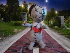 a stuffed animal is standing in the middle of a brick path with stars on it