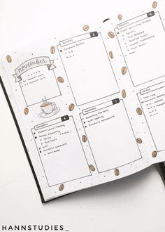 an open planner with coffee beans on it