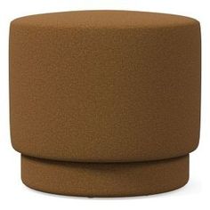 an image of a round ottoman that is brown