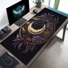 a computer desk with a skull and roses on it