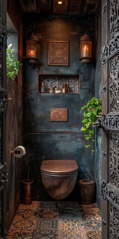 a bathroom with a toilet and potted plant in the corner, surrounded by ornate ironwork