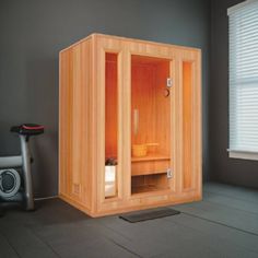 The Southport 3-person indoor traditional steam sauna is constructed of Canadian hemlock wood for a durable yet appealing design. The 3.5kW Harvia heater produces temperatures up to 170 degrees while the included water cask and spoon allow you to add water to the heater stones to get to your desired humidity level. Standard features include a thermo-hygrometer for displaying the humidity level, ergonomic seating for comfort and convenience, interior lighting, a sand timer, and an air ventilation system. SunRay Saunas | SunRay Saunas Southport Person Traditional Steam Sauna 75.0 H x 47.0 W x 69.0 D in brown, Wood in Yellow | 3 | Wayfair Electric Sauna Heater, Canadian Hemlock, Dry Sauna, Indoor Sauna, Sauna Heater, Traditional Saunas, Ergonomic Seating, Finnish Sauna, Steam Sauna