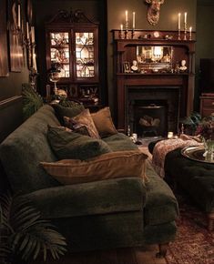 a living room filled with furniture and a fire place