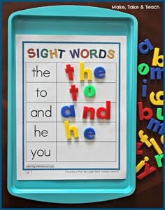 sight words in the shape of letters on a tray