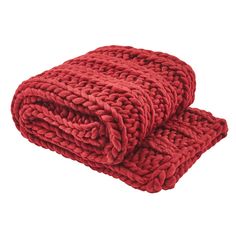 two red knitted blankets sitting on top of each other