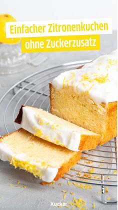 a loaf of lemon pound cake on a cooling rack with one slice cut out and the rest half eaten