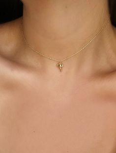 This 24k gold plated mini shark tooth sits on either a 14k gold filled standard chain choker or 14k gold filled satellite chain choker. There is an extender on the clasp in order to adjust length. Sits at 14inches and extends to 16inches. Shark Necklace, Shark Tooth Necklace, Choker Gold, Tooth Necklace, Shark Tooth, Luck Charm, Luck Charms, Shark Teeth, Layering Necklace