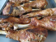 several pieces of meat on a tray ready to be cooked