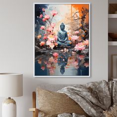 a buddha statue sitting on top of a bed next to a painting