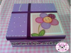 a purple box with a flower painted on it