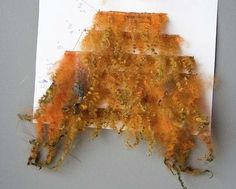 a piece of paper that has been dyed orange