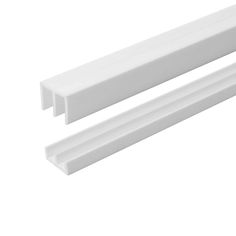 two white plastic shelf brackets on a white background