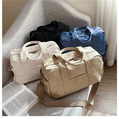 Material: 100% Canvas Size: 32cm X 13cm X 25cm Colors: Black, White ,Blue ,Khaki Usage: This crossbody canvas bag is suitable for daily, school and work. Large capacity: Perfect size canvas bag for your daily accessories such as boos, cell phone, cards or laptop. Can fit 14 inches laptop. (All the things we sell are filmed in real kind,But the light and the display are different,Please allow a bit of color error.) Vintage Canvas Bags, Shoulder Bag For School, Tote Bags For School, School Tote, Over The Shoulder Bags, Cross Body Bags, Canvas Messenger Bag, Chain Crossbody Bag, Genuine Leather Bags