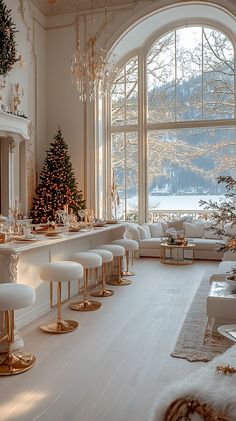 a living room filled with furniture and a christmas tree