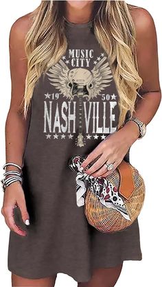 PRICES MAY VARY. ❤ Material: Made of premium cotton blend fabric, soft, comfy and lightweight, skin-friendly, comfortable to wear all day ❤Features: Nashville Music City T-Shirt, Country Music Oversized Shirts for Women, Vintage Guitar Wings Graphic Tees, Rock Band Tops, Nashville Vintage Style Tshirt, Concert Short Sleeve Shirts. Show Off Your Love for Music City and Rock Music In Style! ❤ Occasion:It's an All-Season Mini Dress to Wear at Date,Wear This Dress to a Casual Evening Out for Drinks Country Style Dresses, Nashville Music City, Music City Nashville, Nashville Music, Style Tshirt, Oversized Shirts, Vintage Guitar, Casual Evening, Music City