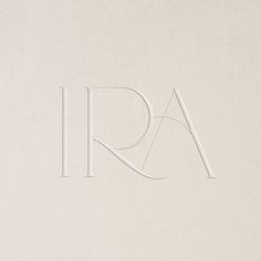 the word aria is written in white paper