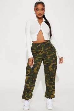 Available In Olive/Combo. Jogger Fit Pant Button & Zipper Front Closure Functional Side Cargo Pockets Adjustable Waistband Straps Medium Stretch Twill Disclaimer: Print Placement May Vary Self: 100% Cotton Imported | Cadet Kim Oversized Camo Pants in Camouflage size Small by Fashion Nova Camouflage Pants, Camo Fashion, Fashion Nova Models, Camo Pants, Fashion Nova Jeans, Adjustable Waistband, Style Mistakes, Curve Dresses, Bottom Clothes