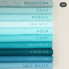 a stack of blue and green sheets with the names of different types of sheets on them