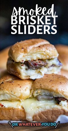 two sandwiches stacked on top of each other with the words smoked brisket sliders