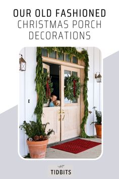 the front door is decorated with christmas wreaths and greenery