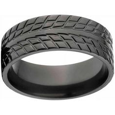 a black wedding band with an intricate design