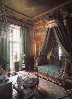 an ornately decorated bedroom with green curtains