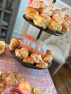 two trays filled with pastries on top of a table