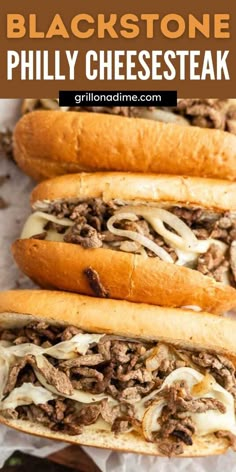 two sandwiches with cheese and meat on them sitting on top of white parchment paper in front of the words blackstone phily cheesesteak