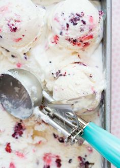 an ice cream dish with scoops and spoons