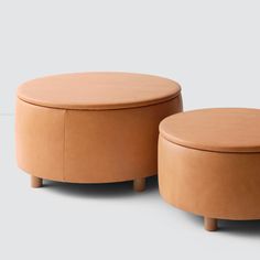 two round stools sitting next to each other