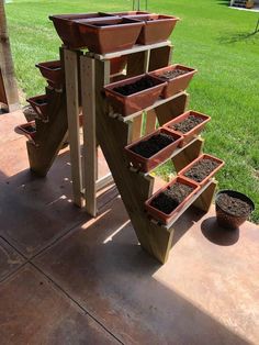 several planters are stacked on top of each other