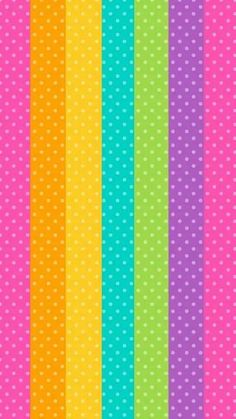 a rainbow colored background with polka dots