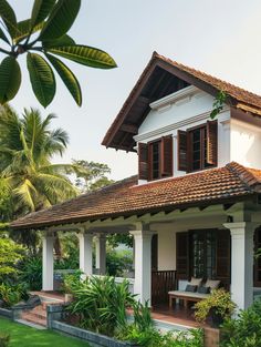 a white house with wooden shutters and windows