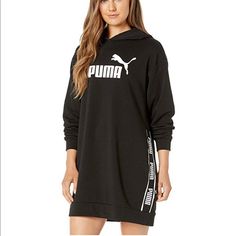 Turn Up The Comfort With The Cute, Casual, And Sporty Puma Amplified Dress Tr. Relaxed Fit Sweater Dress Features An Attached Jersey-Lined Hood And Ribbed Trim At The Cuffs And Hem. Soft Cotton-Poly Blend With A Contrast Puma Wordmark Across The Chest And Repeat Branding Along The Sides. Long Sleeves. Straight Hemline. Main: 68% Cotton, 32% Polyester; Hood Lining: 100% Cotton. Measurements: Length: 33 In Chest Measurement: 40 In Sleeve Length: 33 In Sporty Long Sleeve Dress, Pink Cropped Hoodie, Puma Sweatshirt, Large Sweaters, Sports Hoodies, Black Zip Ups, Polo Sweater, Lifestyle Clothing, Zip Up Sweater