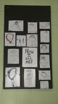 a bulletin board with drawings on it in a school gym wall that says how do you see me?