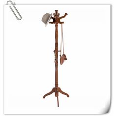 an old fashioned wooden weather vane with two hats on it's poles and a paper clip