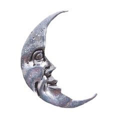 a metal moon with a face on it's side, against a white background