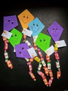 some colorful candy with faces on them